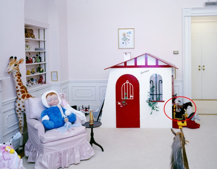 View of Caroline Kennedy's bedroom. White House, Washington, D.C. A red circle added by archivists highlights one of the horse toys listed in the catalog.