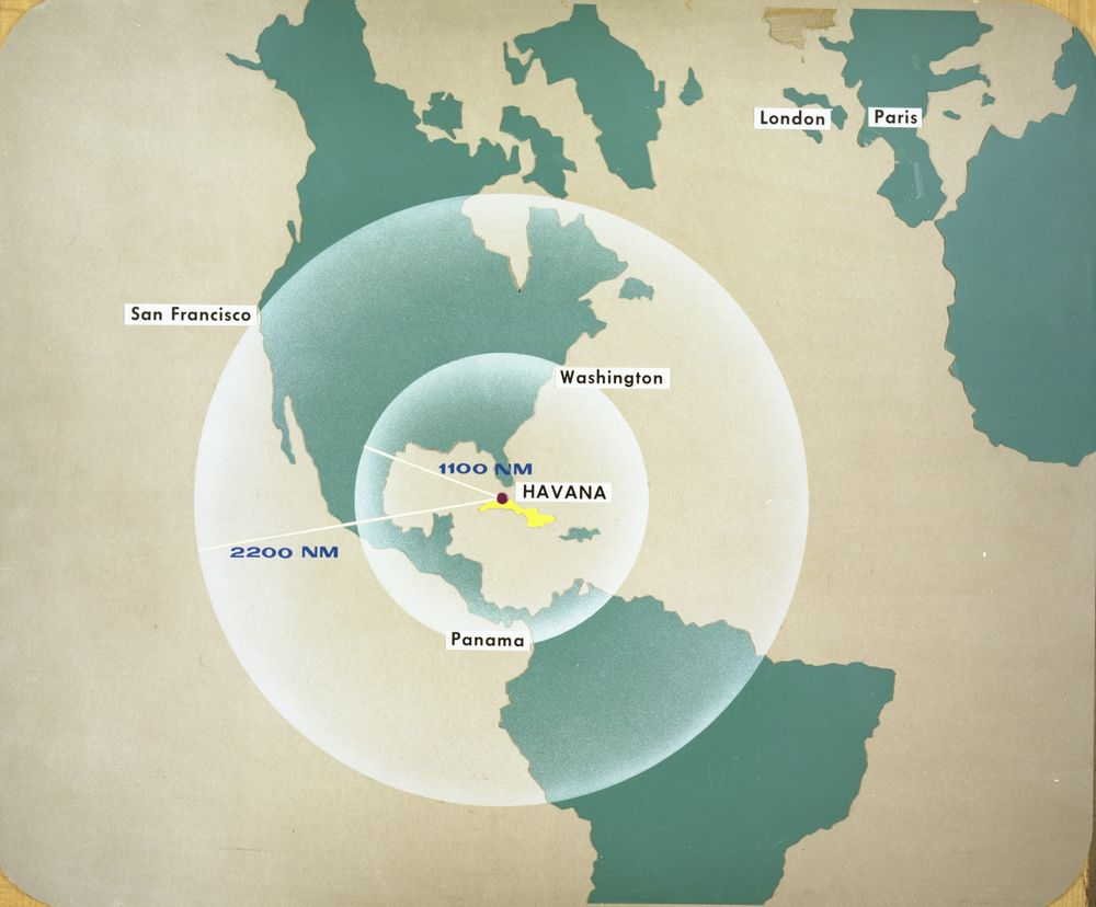 Color image of a map showing North America and Central America, and parts of South America, Europe, and Africa. Two concentric circles centered on Havana, Cuba and covering much of North, Central, and Northern South America show the potential range of Soviet ballistic missiles placed in Cuba.